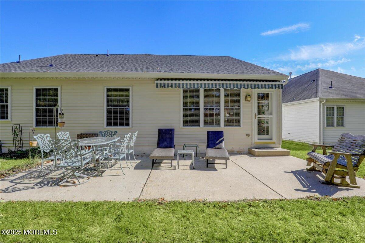 54 Merion Lane Jackson, NJ 08527 - Photo 29 of 46 a backyard of a house with seating space