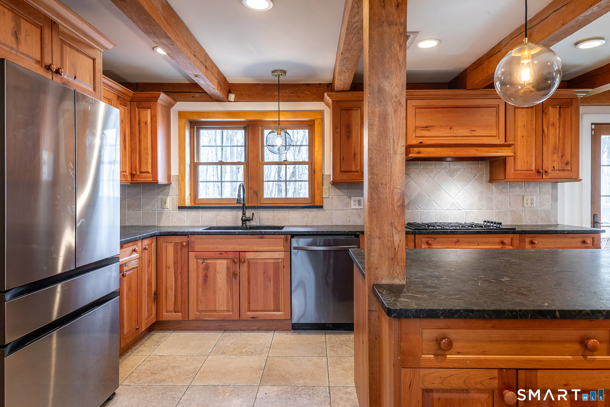 24 Hickory Lane Roxbury, CT 06783 - Photo 12 of 42 a kitchen with stainless steel appliances granite countertop a refrigerator and a stove