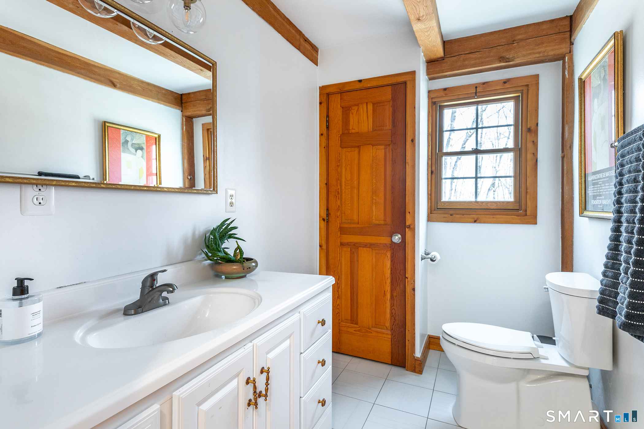 24 Hickory Lane Roxbury, CT 06783 - Photo 19 of 42 a bathroom with a sink a toilet and shower
