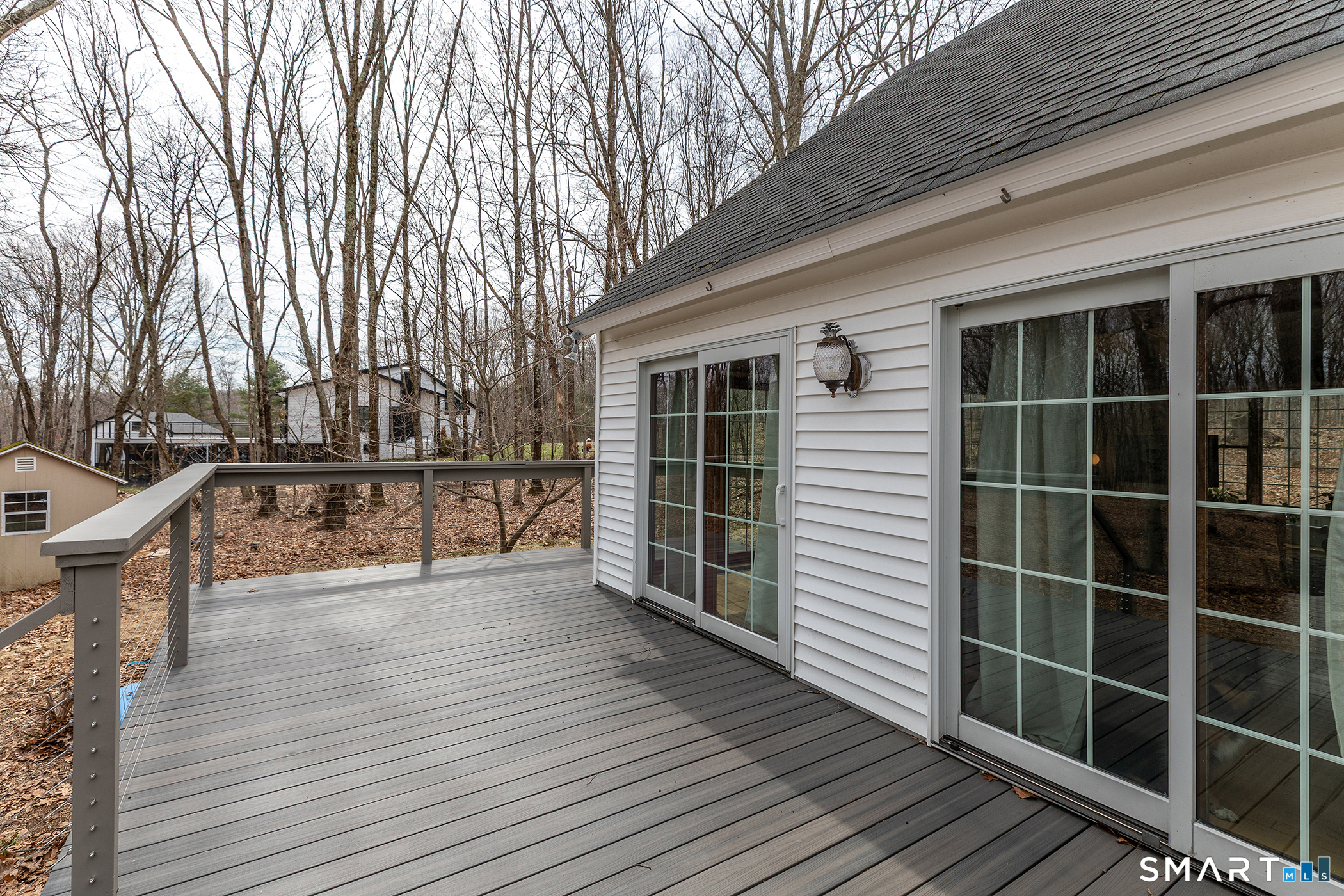 24 Hickory Lane Roxbury, CT 06783 - Photo 31 of 42 a view of a balcony with wooden floor and fence and a pot