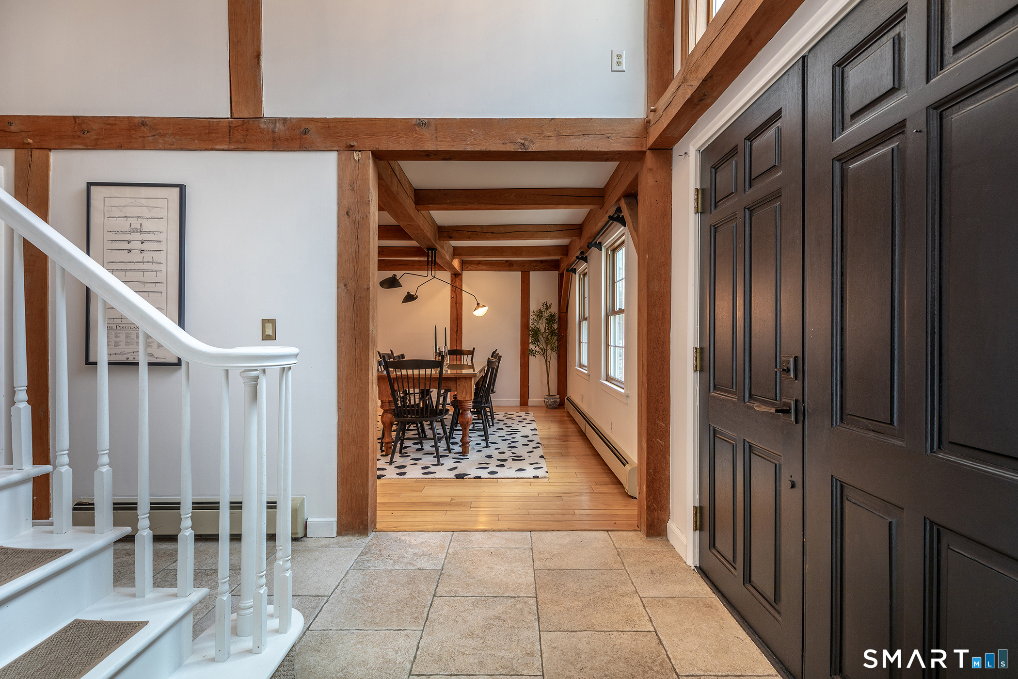 24 Hickory Lane Roxbury, CT 06783 - Photo 7 of 42 a view of front door with dining room and stairs