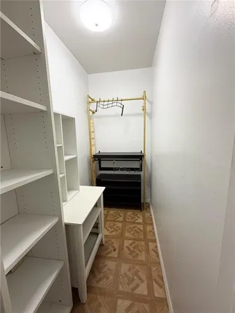 a bathroom with a sink and a washing machine