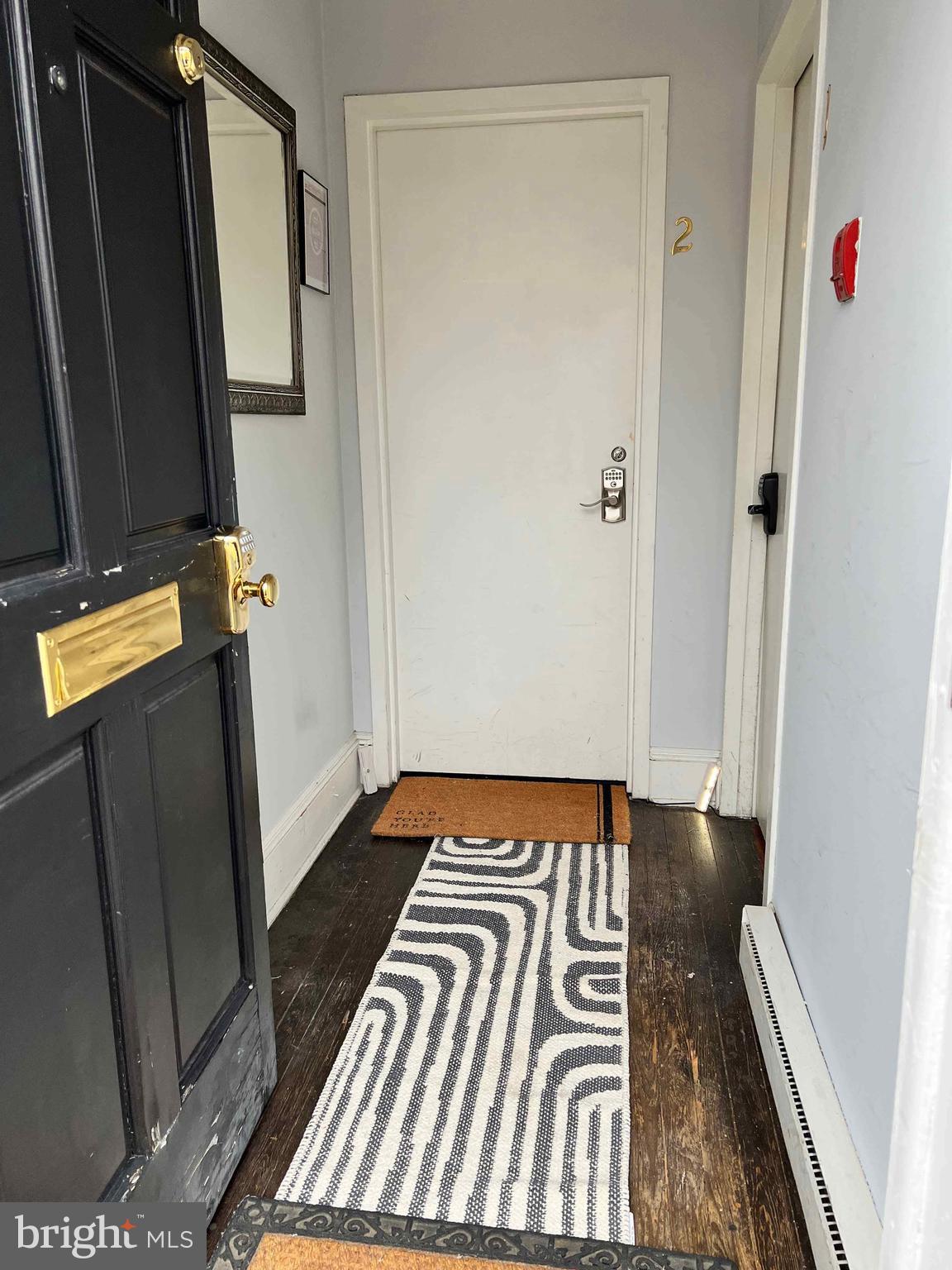 1211 33rd Street Northwest, Unit 1 Washington, DC 20007 - Photo 4 of 18 a view of a hardwood floor and staircase