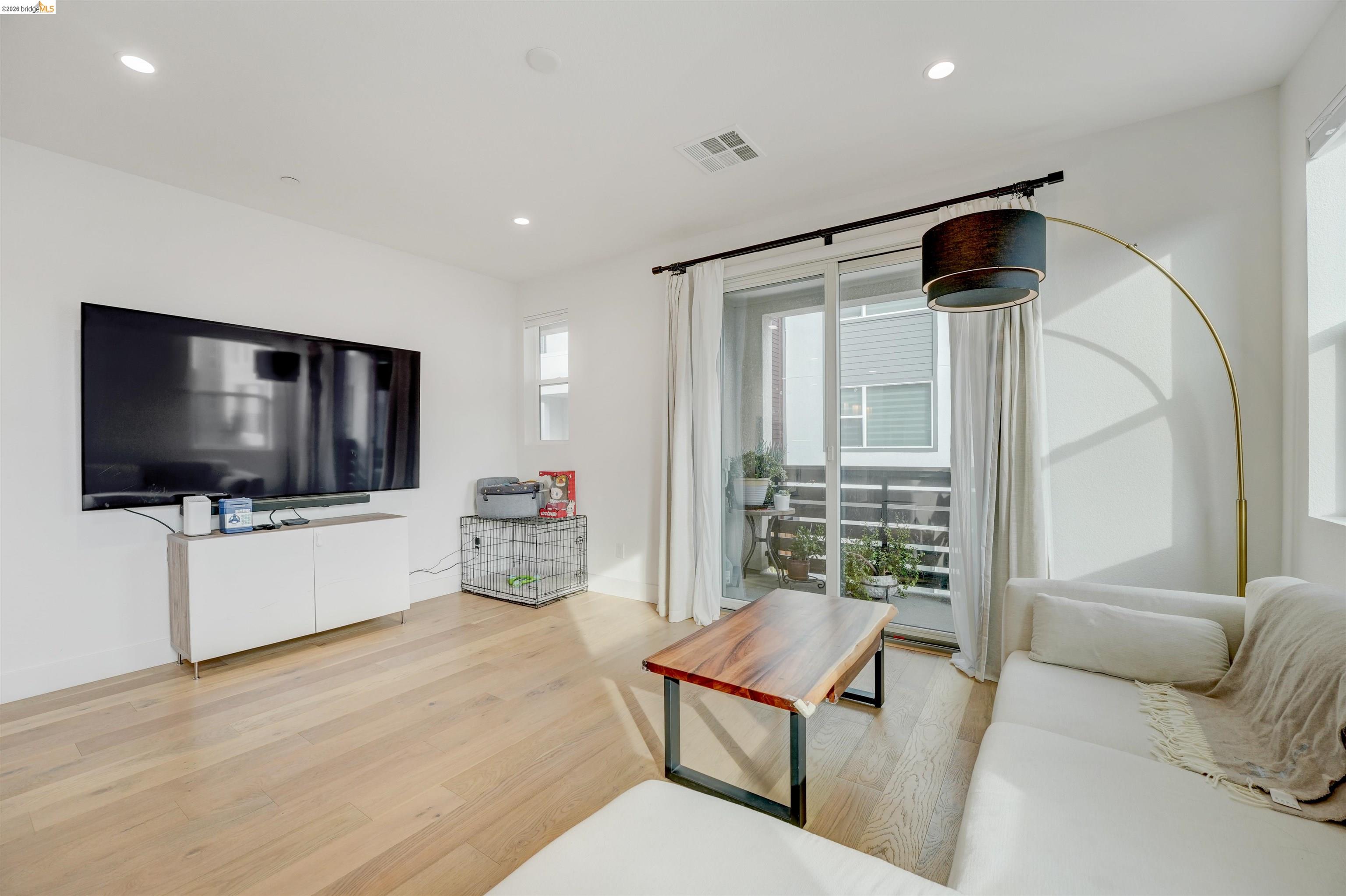 7101 Melon Court San Ramon, CA 94583 - Photo 12 of 58 a living room with furniture and a flat screen tv