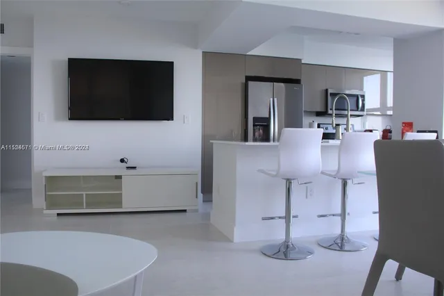 a bedroom with a bed and lamp