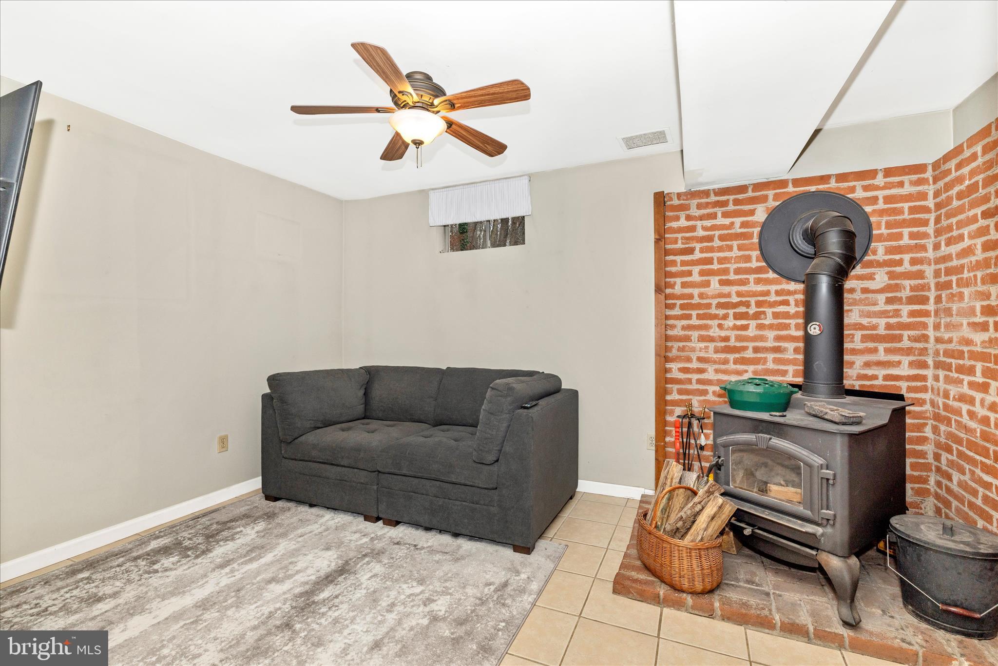 2235 Bowersox Road New Windsor, MD 21776 - Photo 22 of 35 a living room with furniture and a wooden floor