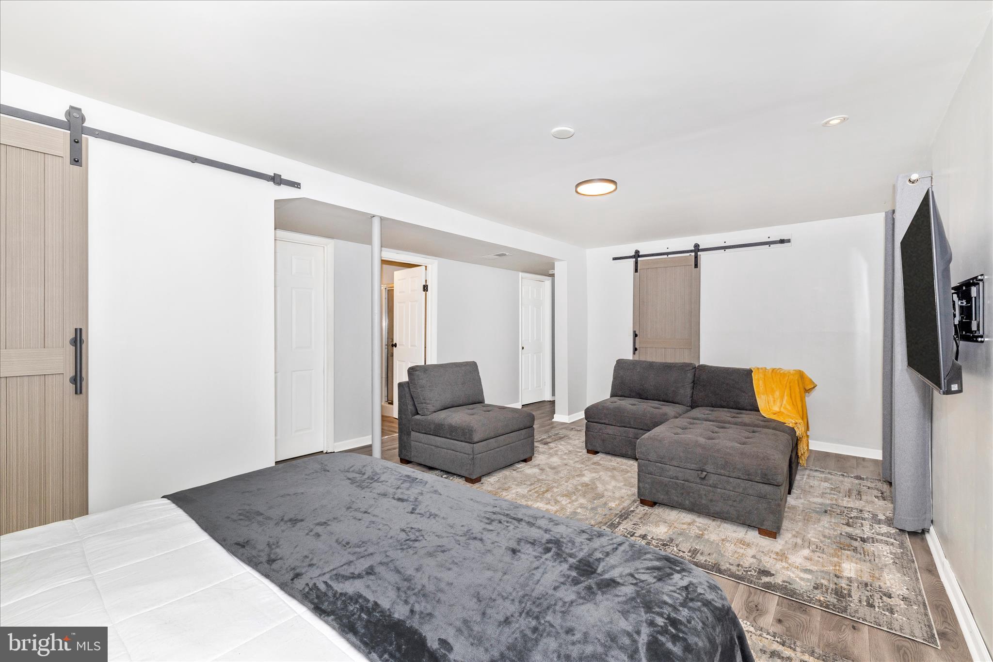 2235 Bowersox Road New Windsor, MD 21776 - Photo 27 of 35 a living room with furniture and a flat screen tv