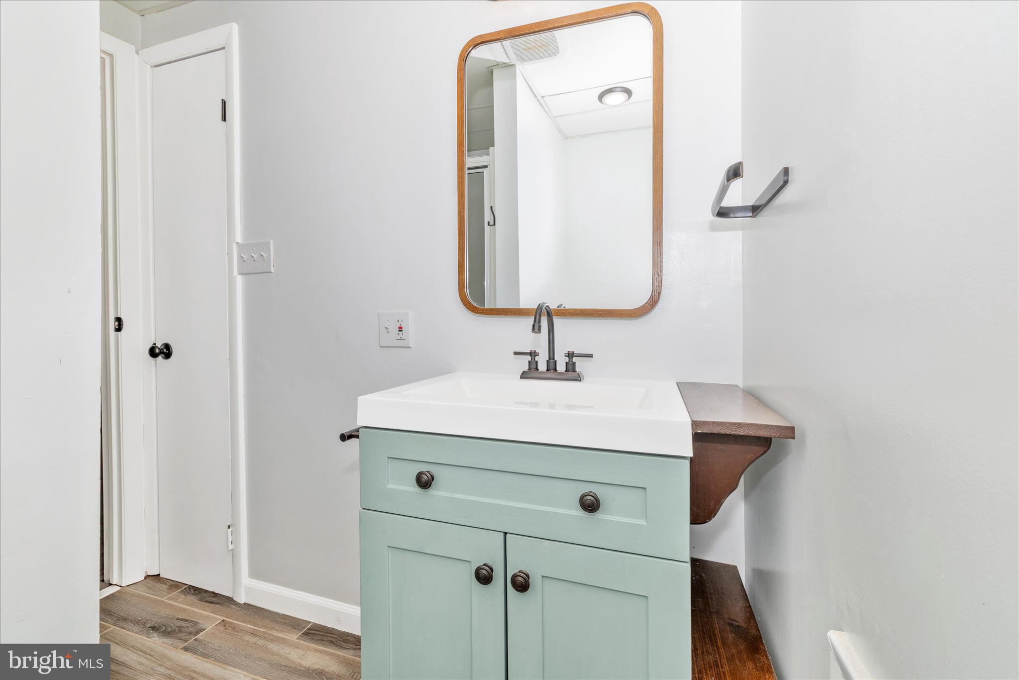 2235 Bowersox Road New Windsor, MD 21776 - Photo 29 of 35 a bathroom with a sink vanity and a mirror