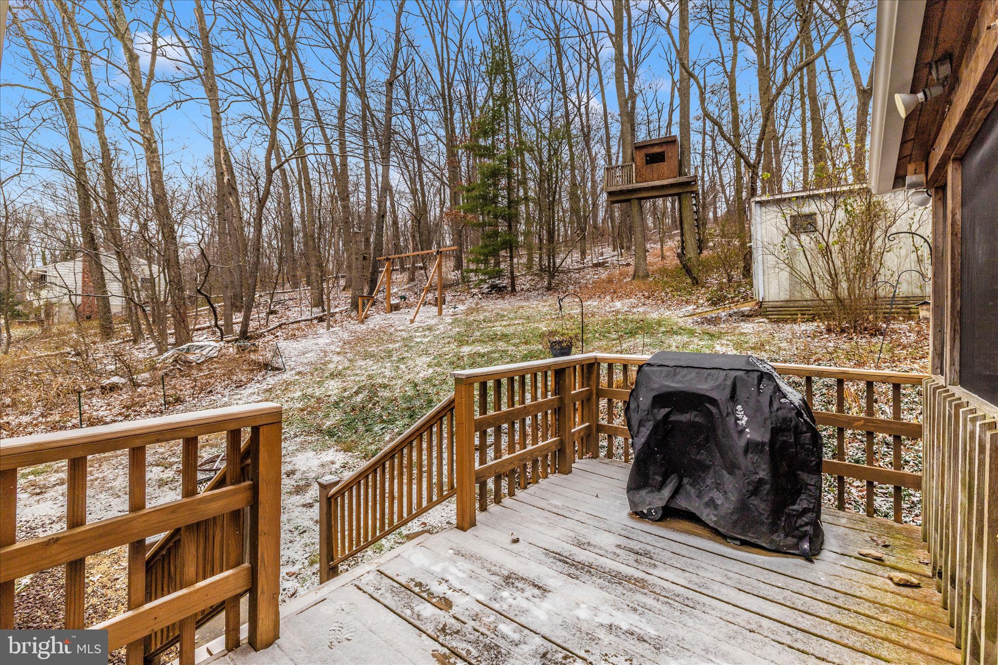 2235 Bowersox Road New Windsor, MD 21776 - Photo 34 of 35 a view of a balcony with wooden fence and large trees