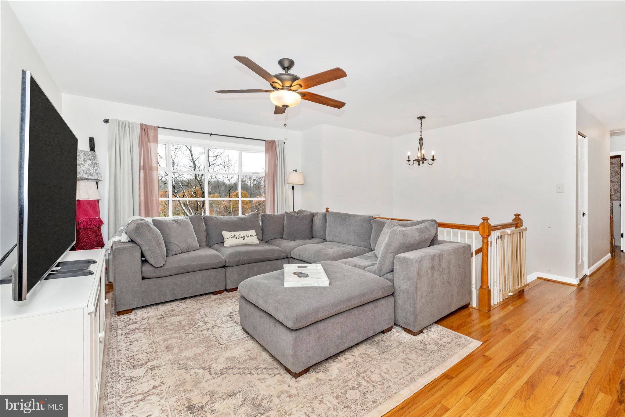 2235 Bowersox Road New Windsor, MD 21776 - Photo 5 of 35 a living room with furniture and a flat screen tv