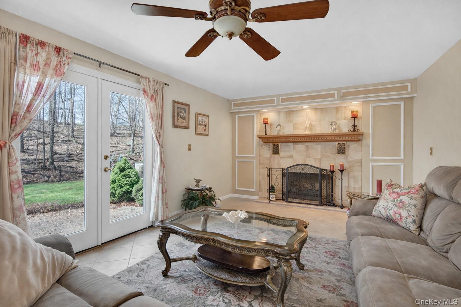 449 West Mombasha Road Monroe, NY 10950 - Photo 31 of 39 a living room with furniture and a fireplace