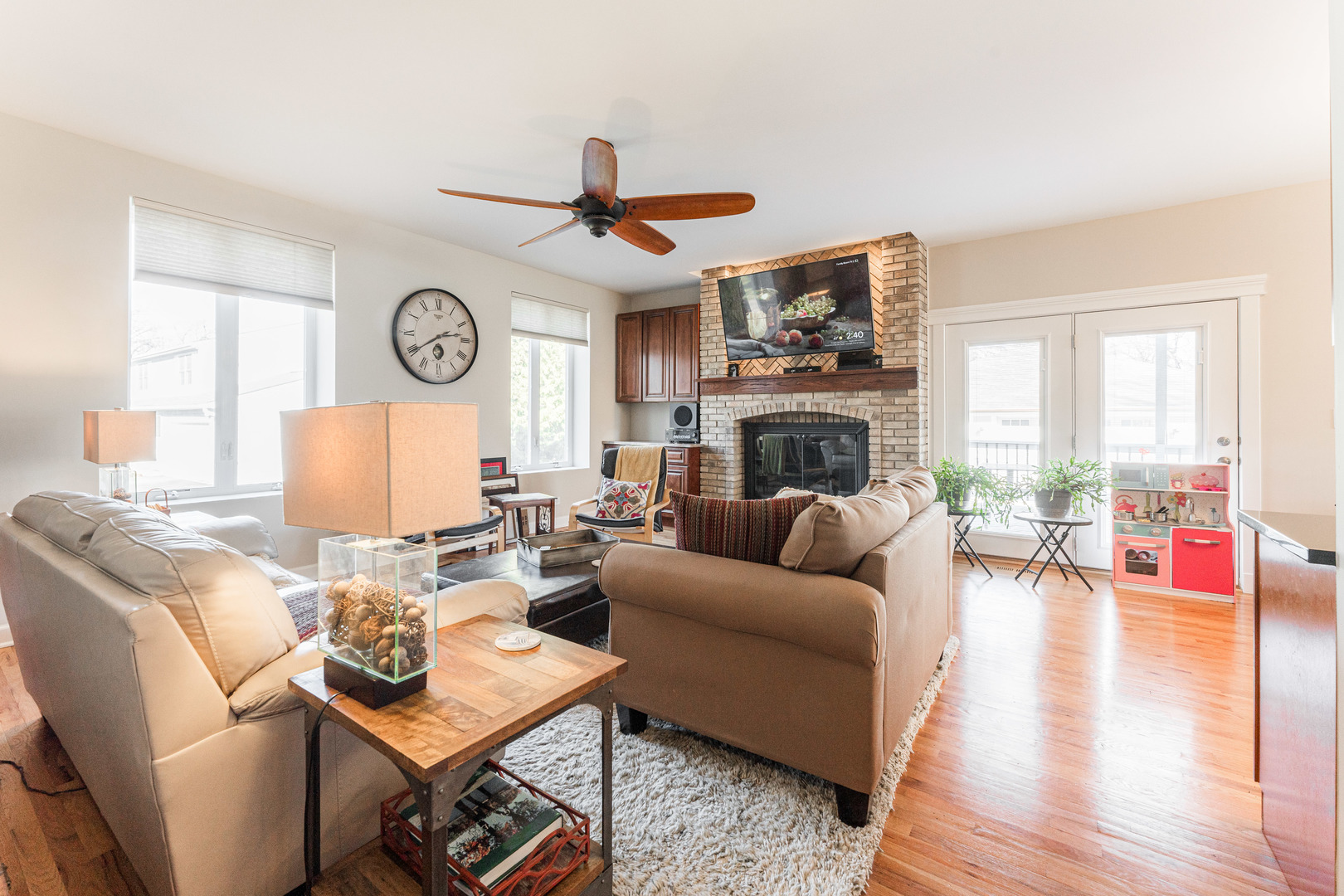 181 North Prince Crossing Road West Chicago, IL 60185 - Photo 11 of 62 a living room with furniture a fireplace and wooden floor