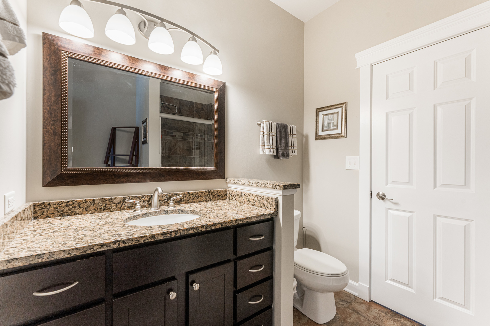 181 North Prince Crossing Road West Chicago, IL 60185 - Photo 23 of 62 a bathroom with a granite countertop sink toilet and mirror