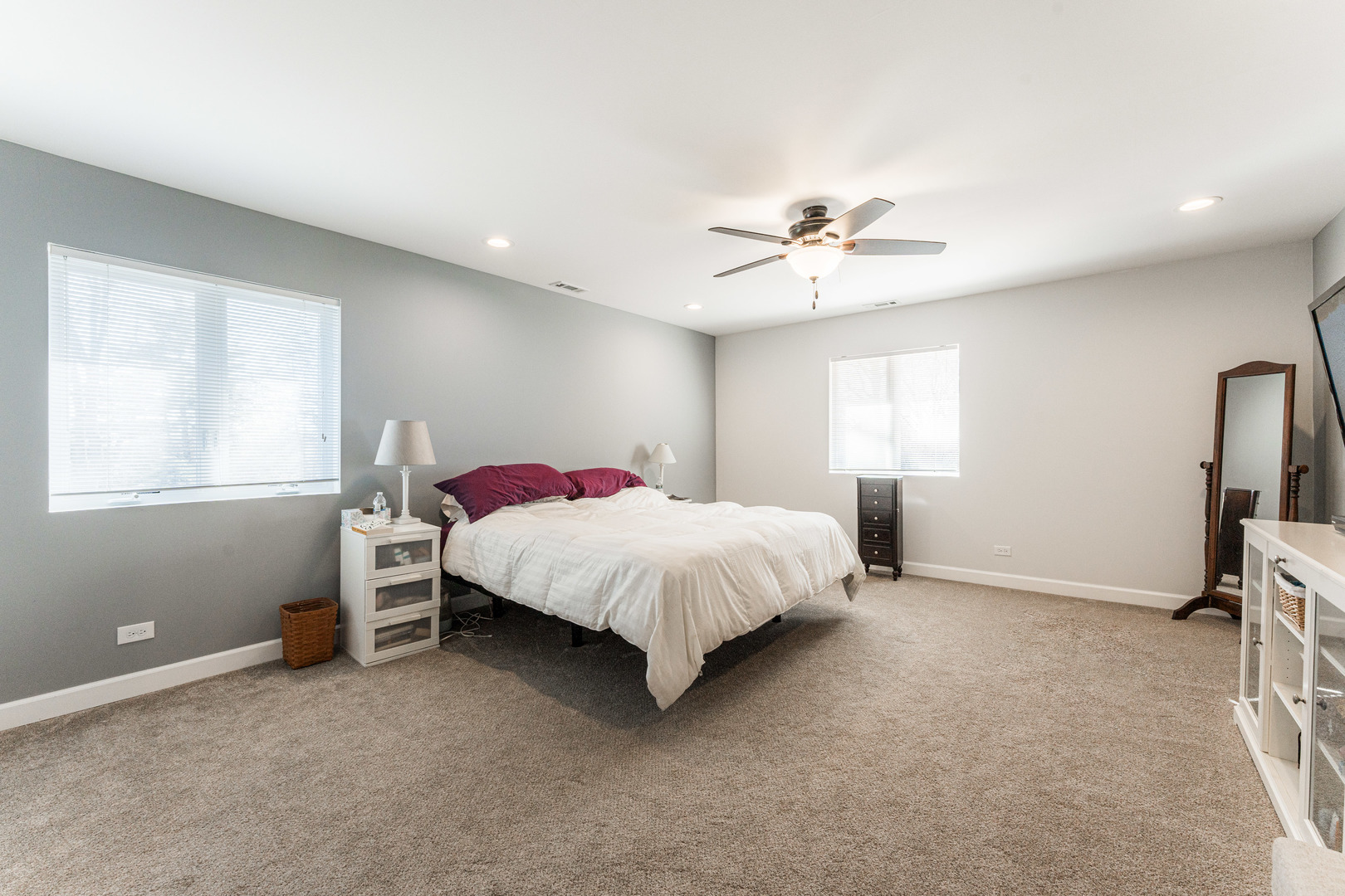 181 North Prince Crossing Road West Chicago, IL 60185 - Photo 26 of 62 a bed room with a bed and a ceiling fan