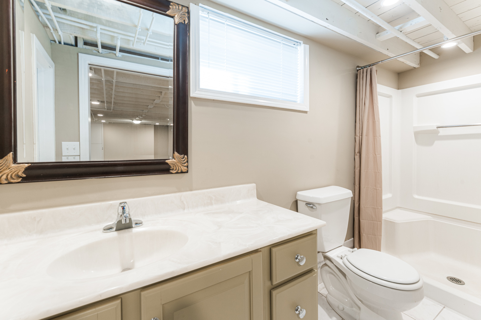 181 North Prince Crossing Road West Chicago, IL 60185 - Photo 40 of 62 a bathroom with a sink a toilet and a mirror