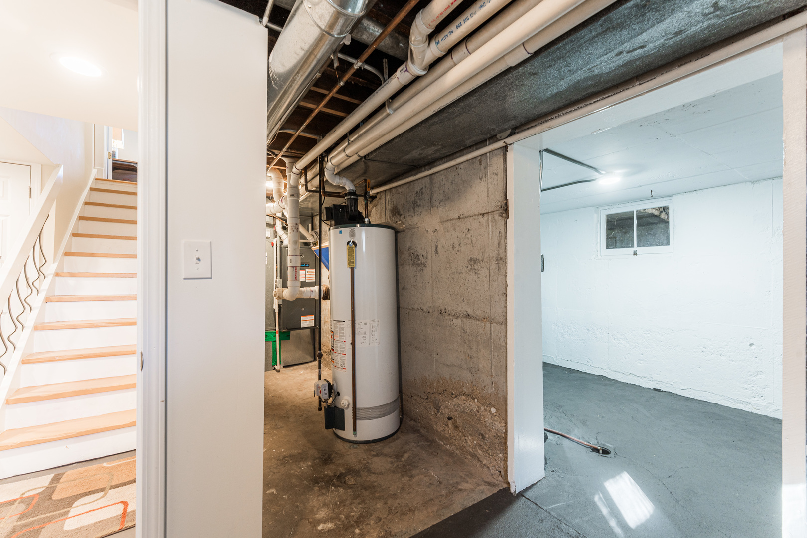 181 North Prince Crossing Road West Chicago, IL 60185 - Photo 46 of 62 a view of a hallway with wooden cabinets and entryway