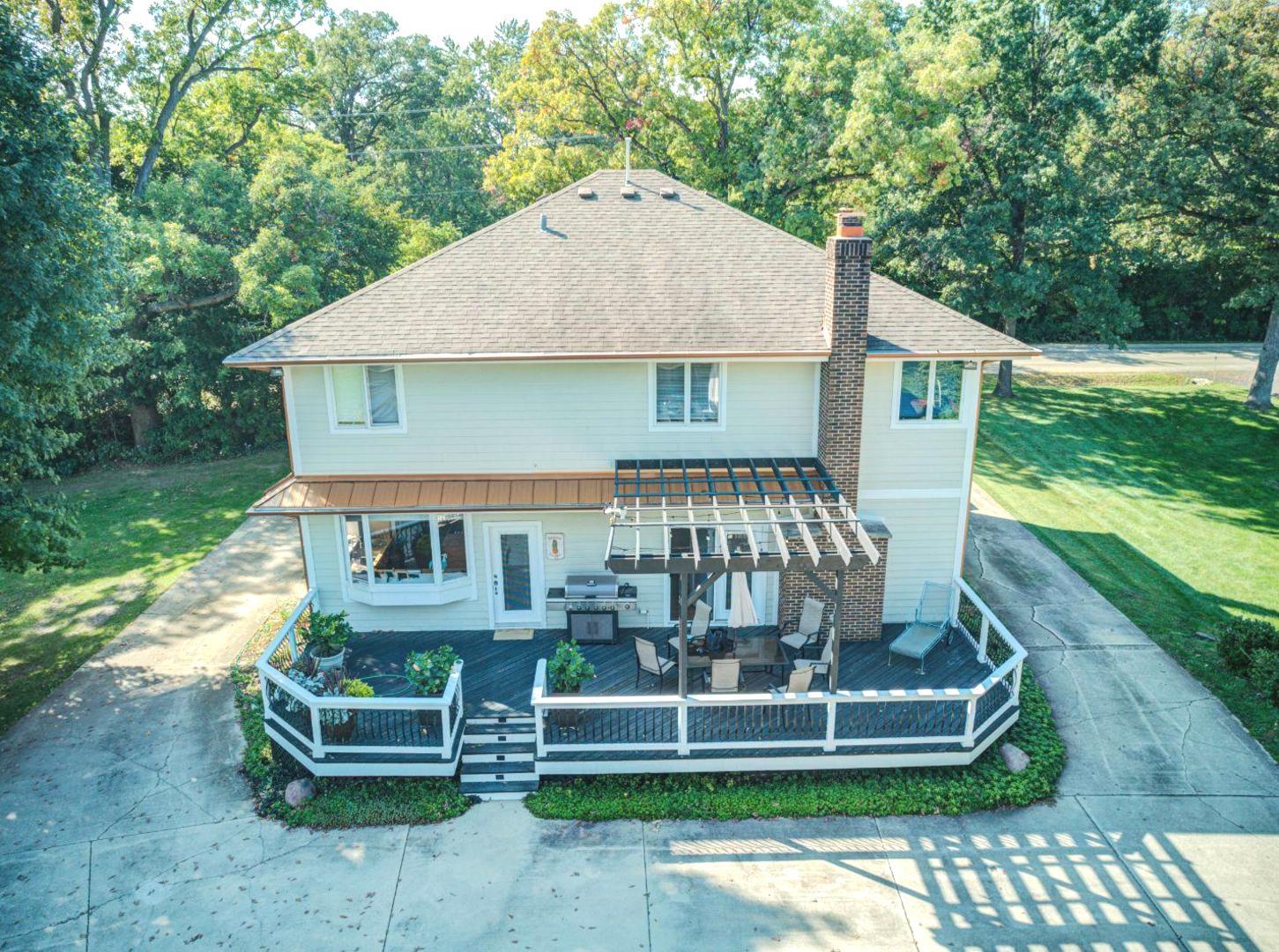 181 North Prince Crossing Road West Chicago, IL 60185 - Photo 5 of 62 a front view of a house with a yard