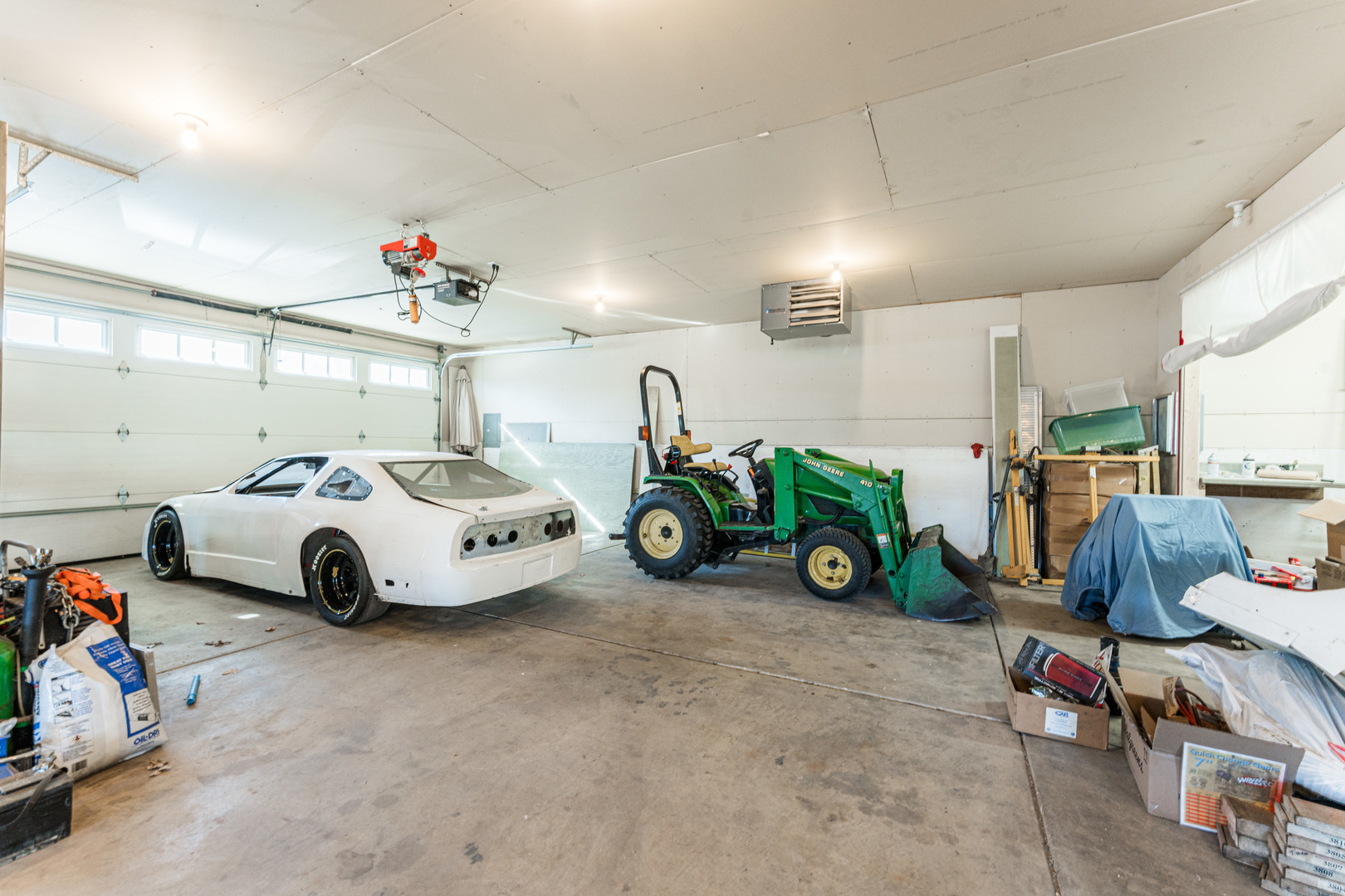 181 North Prince Crossing Road West Chicago, IL 60185 - Photo 57 of 62 a view of parking garage with cars and other equipment