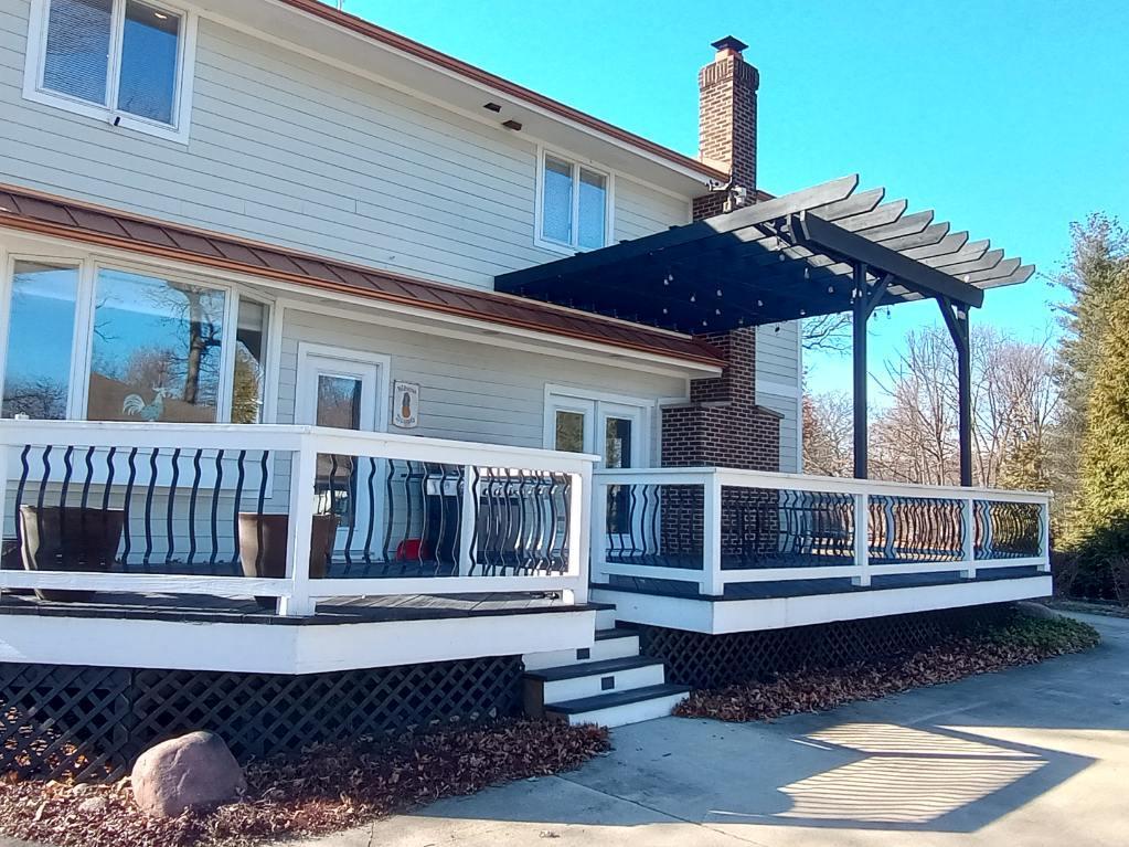 181 North Prince Crossing Road West Chicago, IL 60185 - Photo 6 of 62 a front view of a house with a balcony