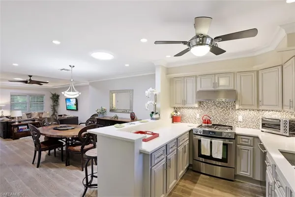 a view of a house with a garage and a yard