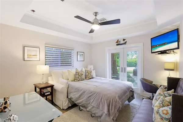 a bathroom with a sink vanity granite and a mirror