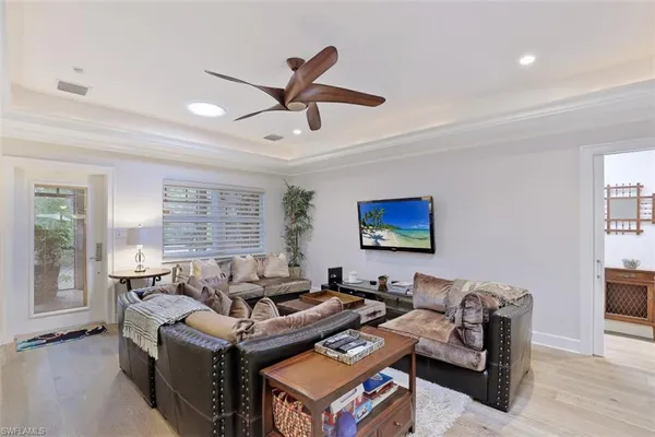 a living room with furniture and a window