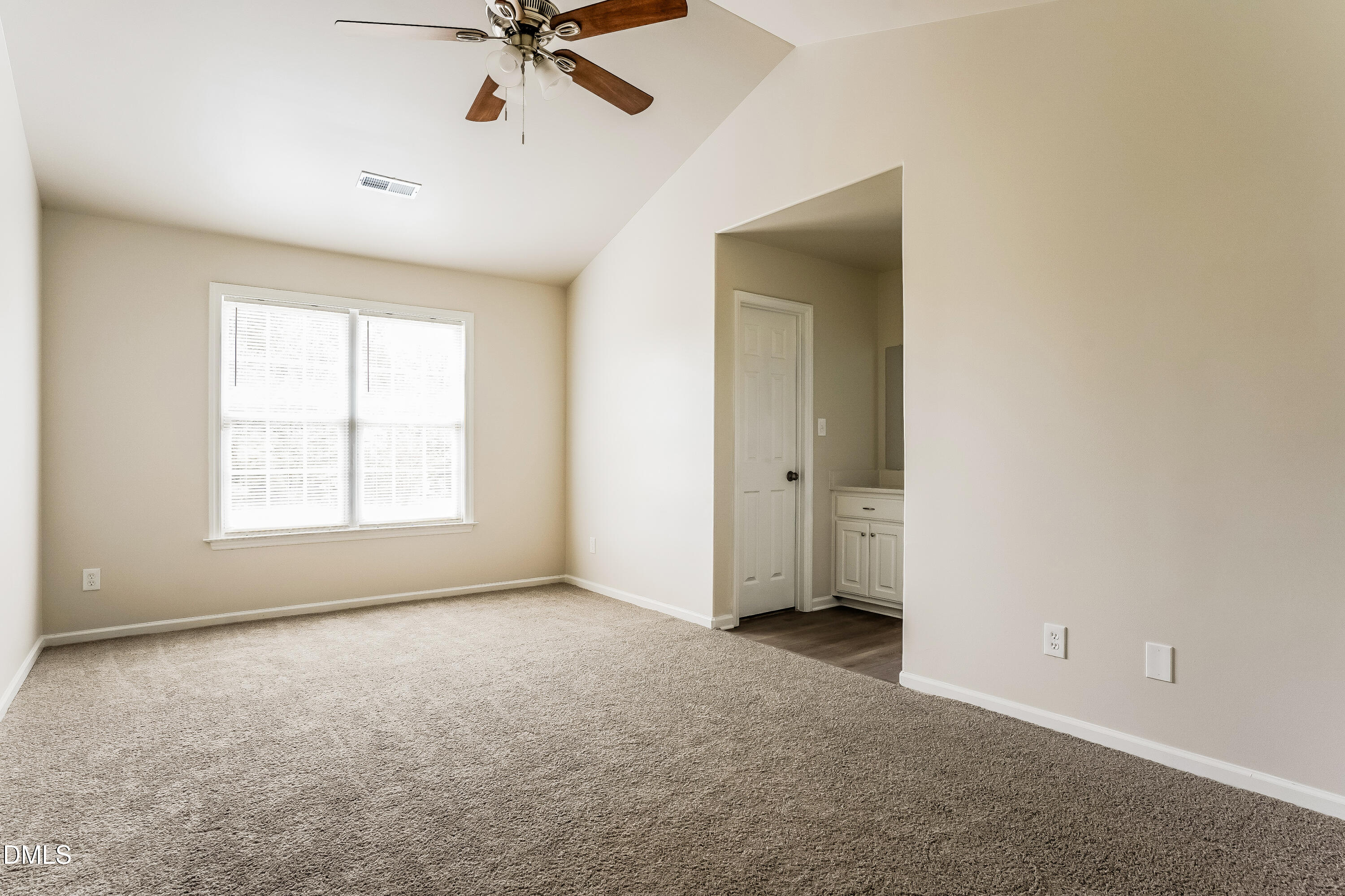 99 Jethro Circle Smithfield, NC 27577 - Photo 8 of 16 a view of a livingroom with a ceiling fan and window
