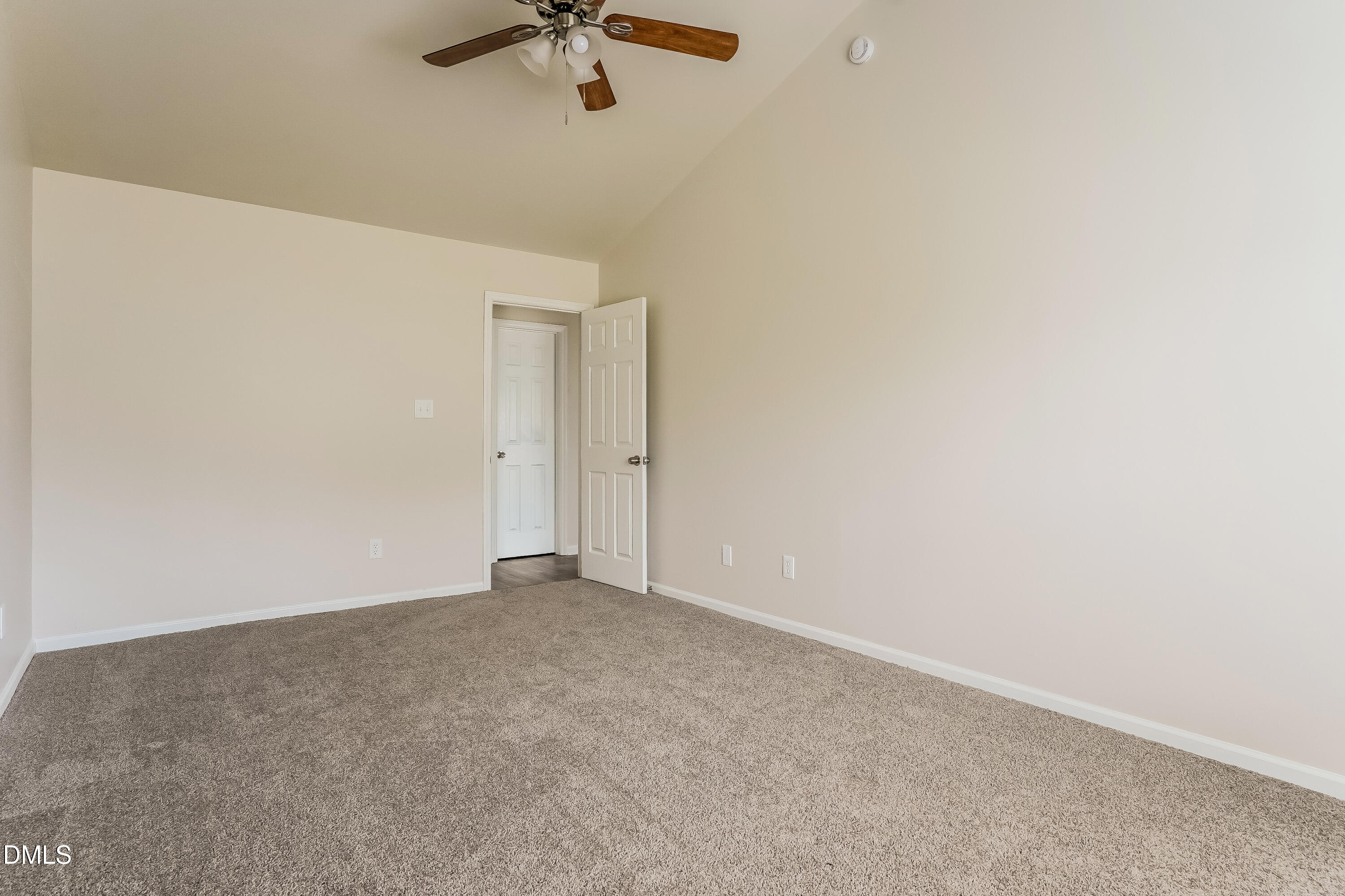 99 Jethro Circle Smithfield, NC 27577 - Photo 9 of 16 an empty room with a fan