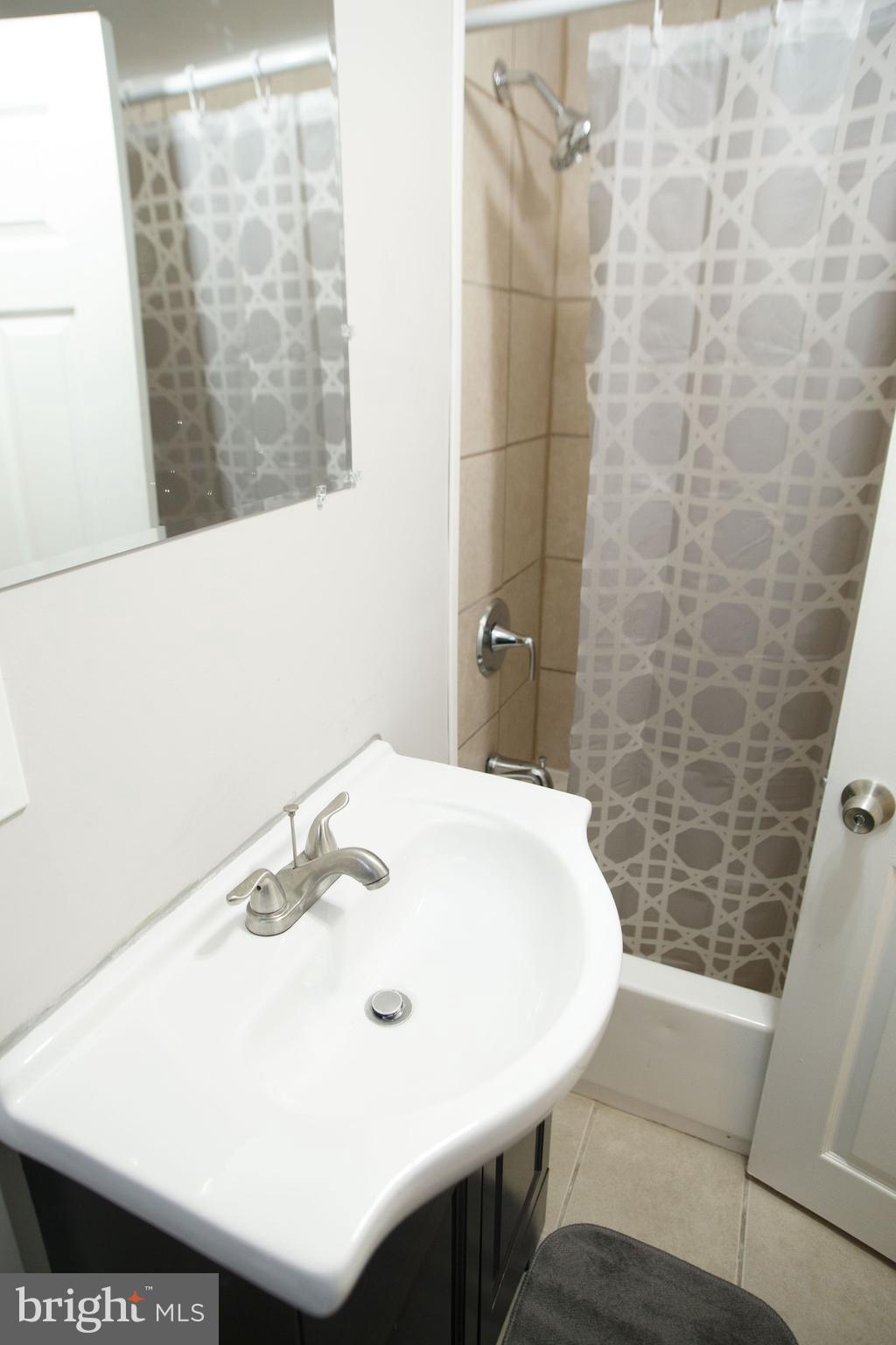 1550 Sheffield Road Baltimore, MD 21218 - Photo 29 of 34 Lower Full Bath