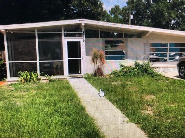 8712 Ruth Place Tampa, FL 33604 - Photo 1 of 1 a house view with a outdoor space
