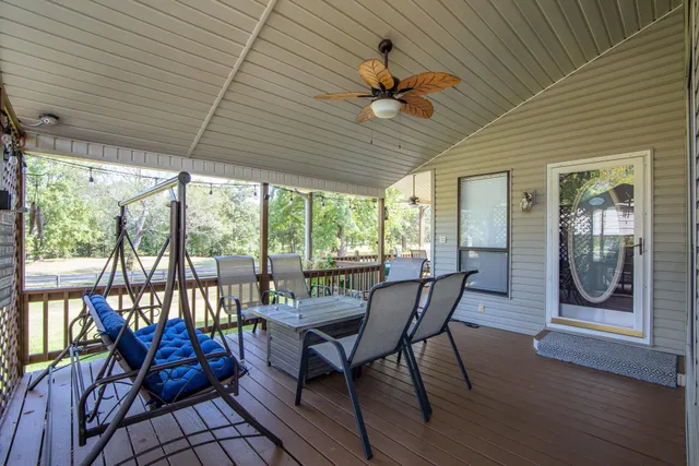 a view of a two chairs in the patio