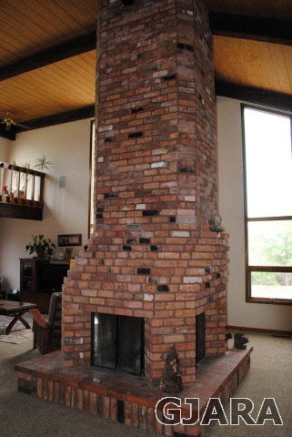 2561 I Road Grand Junction, CO 81505 - Photo 11 of 38 a brick building with black stainless steel appliances
