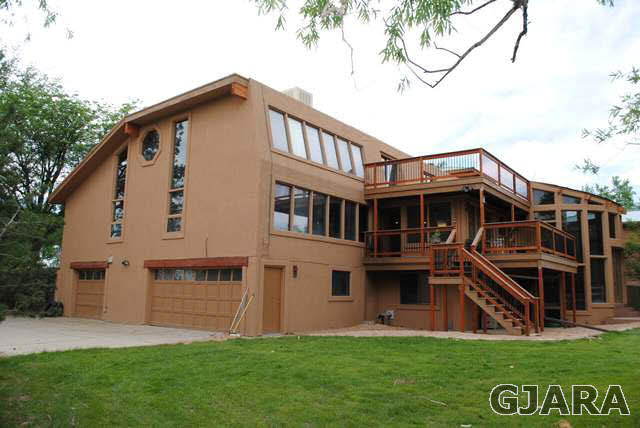 2561 I Road Grand Junction, CO 81505 - Photo 2 of 38 a view of a house with a yard