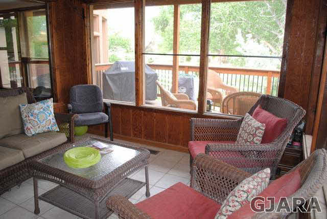 2561 I Road Grand Junction, CO 81505 - Photo 27 of 38 a living room with furniture and a large window
