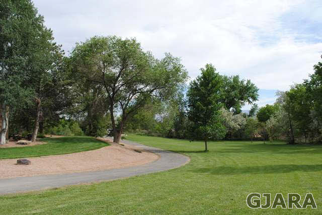 2561 I Road Grand Junction, CO 81505 - Photo 3 of 38 a view of a park with large trees