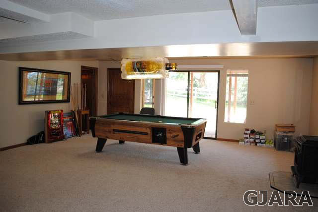 2561 I Road Grand Junction, CO 81505 - Photo 36 of 38 a room with pool table and windows