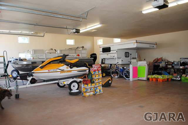 2561 I Road Grand Junction, CO 81505 - Photo 37 of 38 a car is parked in a garage