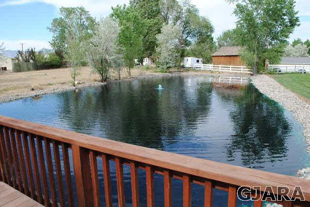 2561 I Road Grand Junction, CO 81505 - Photo 7 of 38 a view of a lake from a balcony
