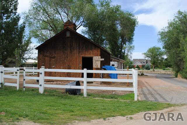 2561 I Road Grand Junction, CO 81505 - Photo 9 of 38 a view of house with backyard