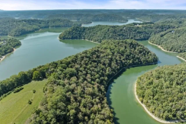 an aerial view of lake residential house with outdoor space