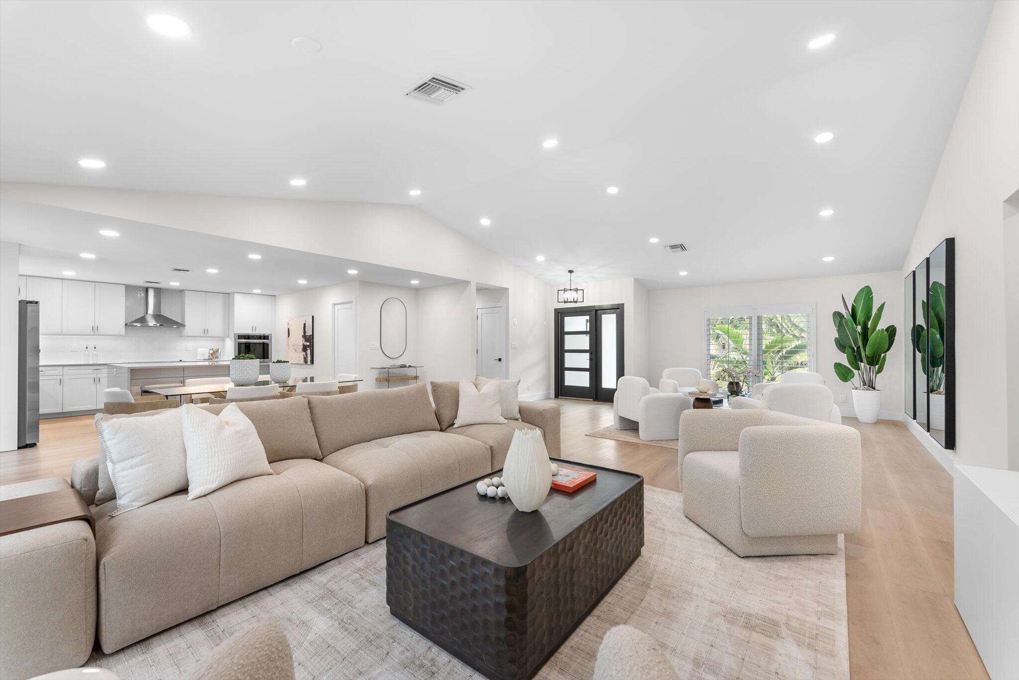 1480 Southwest 19th Street Boca Raton, FL 33486 - Photo 25 of 62 a living room with furniture kitchen and a large window