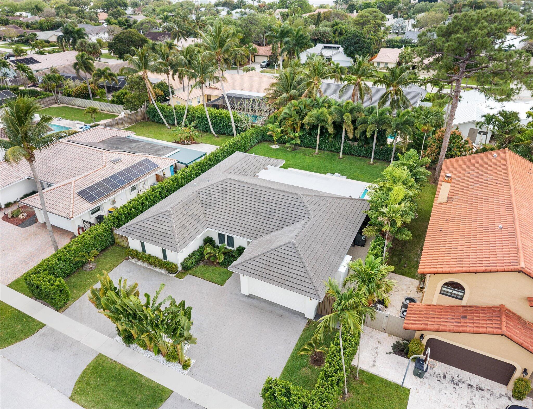 1480 Southwest 19th Street Boca Raton, FL 33486 - Photo 50 of 62 an aerial view of a house with a yard and a large tree