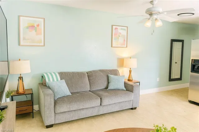 a living room with furniture and a couch