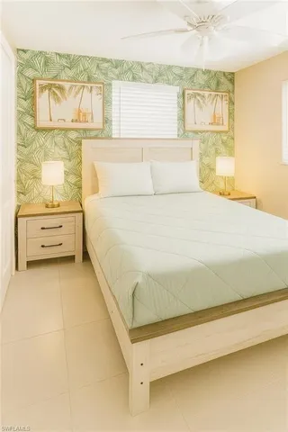 a bathroom with a bathtub and a window