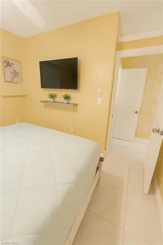 a living room with a flat screen tv