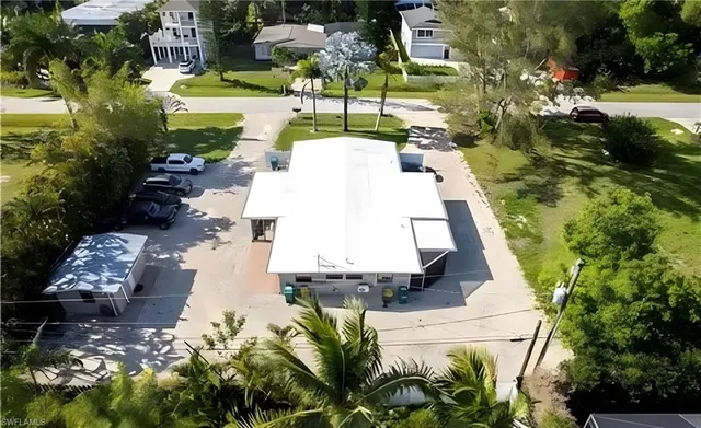 a view of a swimming pool with a yard