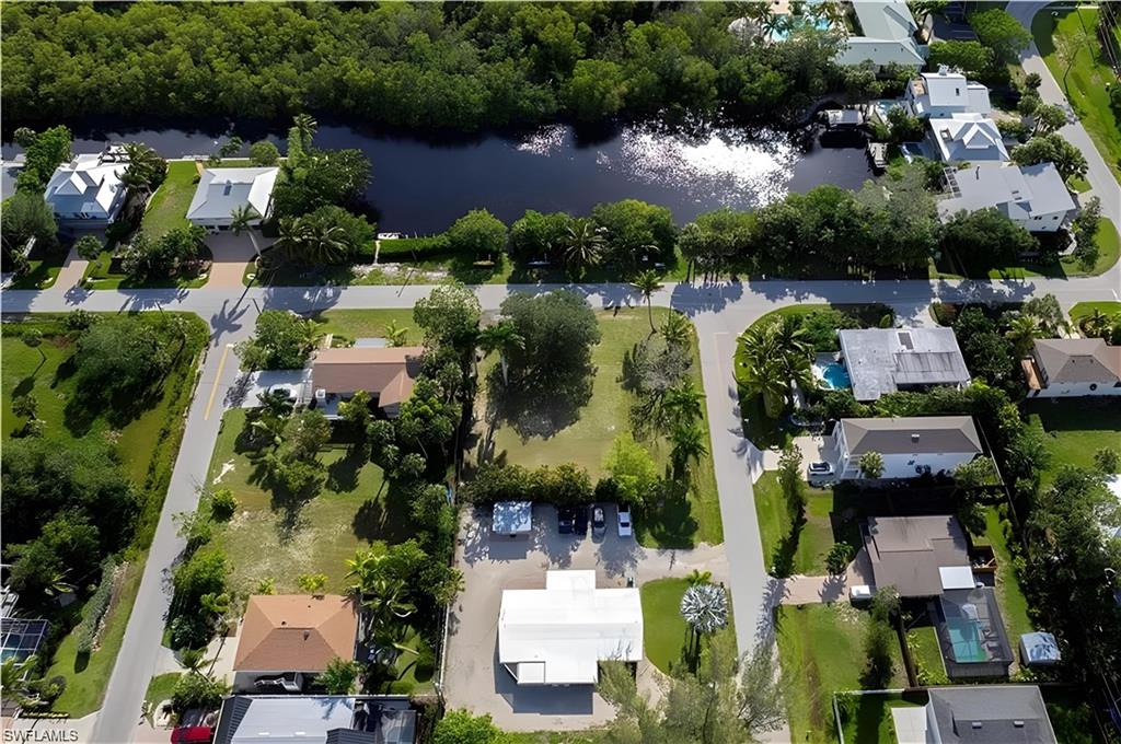 726 Park Avenue Naples, FL 34110 - Photo 28 of 32 an aerial view of residential house with outdoor space and lake view