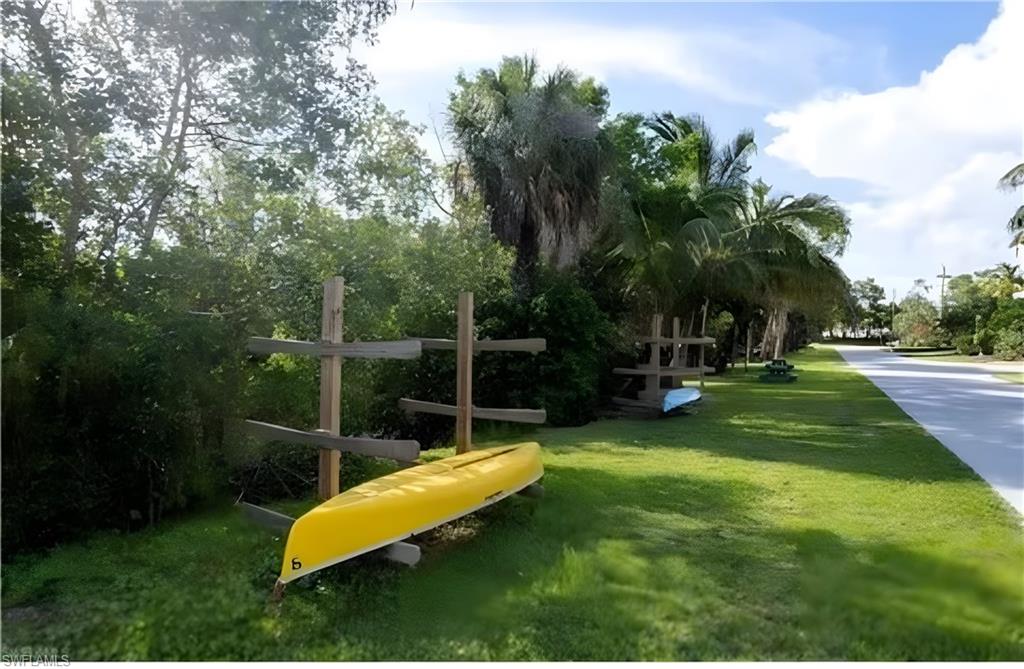 726 Park Avenue Naples, FL 34110 - Photo 29 of 32 a view of a garden with a slide