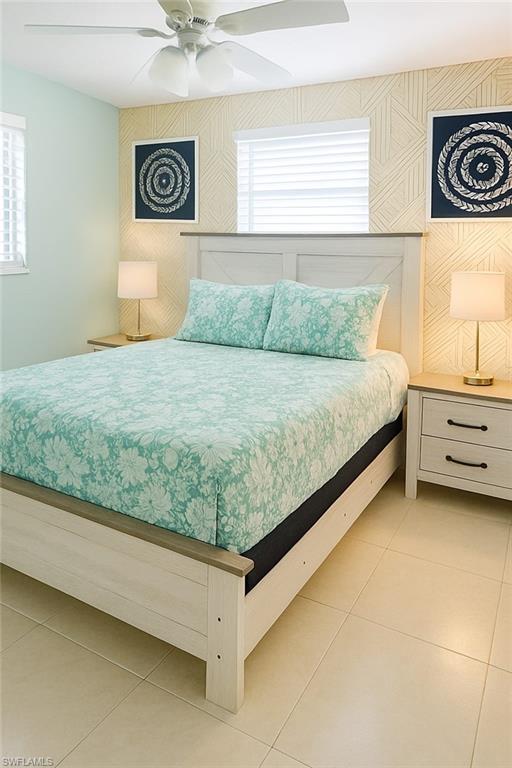 726 Park Avenue Naples, FL 34110 - Photo 8 of 32 a bed sitting in a bedroom next to a window