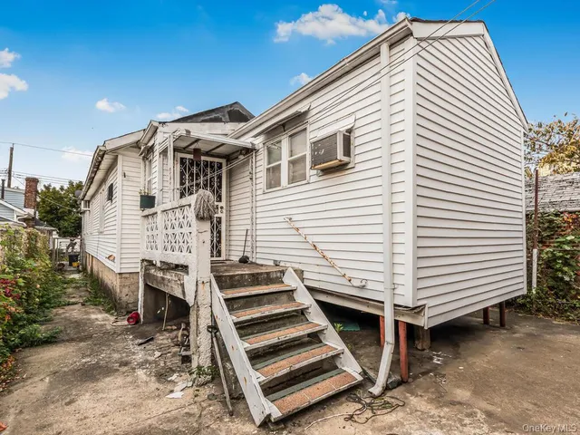 a front view of a house with a balcony